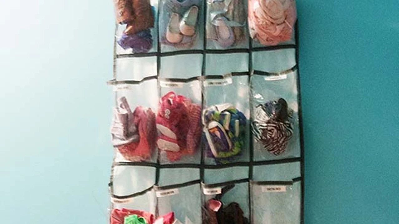 Two mint chocolate milkshakes with whipped cream and green sprinkles.