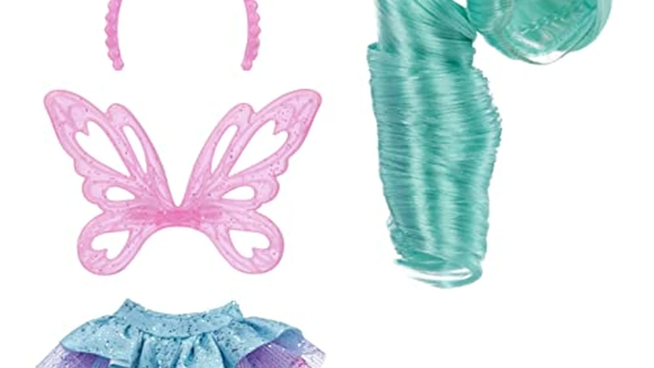 Close up on a plate of mashed potatoes, topped with baked pork chops with cream of mushroom soup, and a side of green beans.